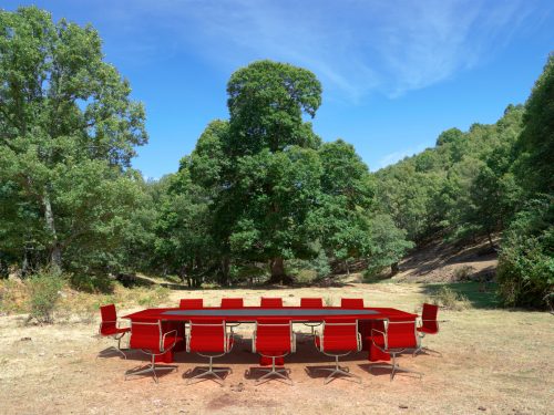 Meeting table and chairs in middle of the countryside